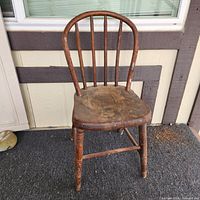 Front view of wooden spindle-back chair
