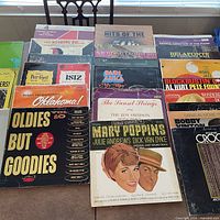 Front view of assorted record sleeves showing titles such as Mary Poppins, Oldies But Goodies, Oklahoma!, Blockbuster, Rod Stewart