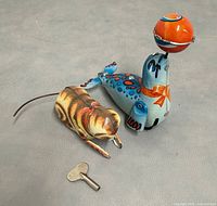 Seal, cat toy and key group shot