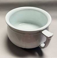 Top angled view of white ironstone chamber pot