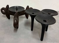 Both candleholders angled side view