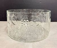 Front view of clear glass Flora bowl showing embossed floral design