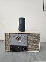 Front view of Zenith clock radio with Amazon Echo on top