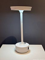Front view of white LED touch lamp illuminated