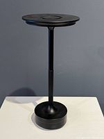 Full front view of the lamp standing upright