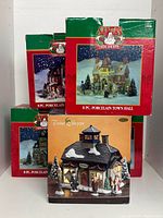 Five Santa’s Trim Shoppe boxed porcelain buildings