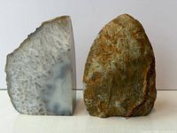 Back view showing rough natural exterior of geode halves