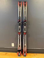 Full front view of both Volkl TigerShark 8ft skis standing together