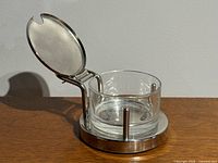 Cheese cellar with lid open showing glass insert and stainless frame