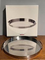 Tray displayed in front of retail box