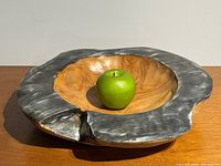 Top view showing overall shape, grain, and blackened rim