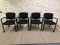 Front view of all four Haworth Improv chairs