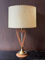 Full view of teak heart lamp with shade