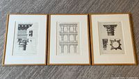 Overview of the three framed architectural prints side by side