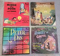 All four Disney vinyl LP jackets laid out