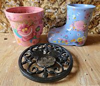 All three items: Cheshire Cat planter, Epcot boot planter, Mickey trivet