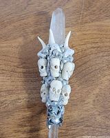 Upper section showing quartz point and skull-horn decoration