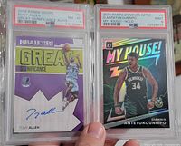 Front of both PSA-slabbed cards side by side