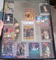 All 12 NBA trading cards arranged in three rows on display board
