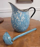 Pitcher and ladle overall view