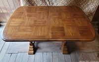 top view of parquet-pattern wood dining table
