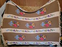 Full view of afghan showing overall pattern and fringe