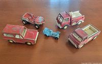 Group shot of all five Tootsietoy vehicles