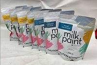 Seven Fusion milk paint powder pouches lined up