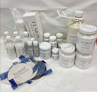 group shot of all Fusion Mineral Paint products, sprayer, jar openers