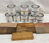 All eight cans stacked with sample blocks in front