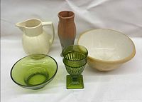 Front view of all five items: pitcher, mixing bowl, vase, goblet, glass bowl
