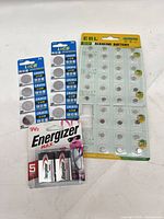 Group shot showing EBL LR41 20-pack, two LiCB CR2032 5-packs, Energizer Max 9V 2-pack