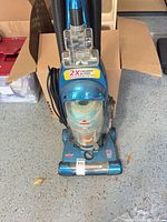 Front view of Bissell upright vacuum showing full unit