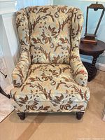 Front view showing overall chair design and upholstery pattern