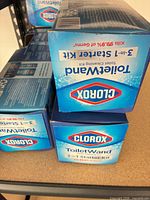 Three of the four Clorox ToiletWand boxes on shelf