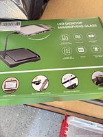 Retail box front showing product image and feature icons