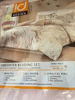Front of packaged Intelligent Design comforter set showing pattern and branding