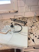 overview showing cutting board, rack, electric base, white plastic holders