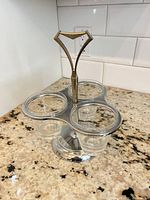 overall view of holder with glasses on countertop
