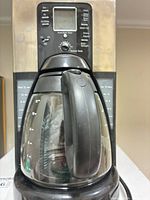 Front view of coffee maker with carafe in place
