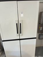 Front view of closed tall plastic cabinet