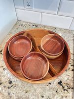 Top view of large divided bowl with six small bowls nested