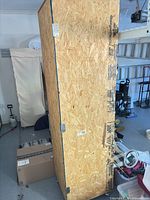 Full height view of OSB wooden crate standing upright