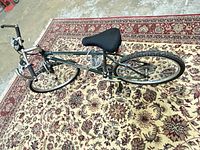 Full view of bike right side showing frame, wheels, and accessories