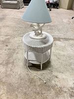 Lamp on table full view showing both items.