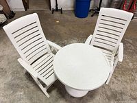 Table and two matching chairs overview