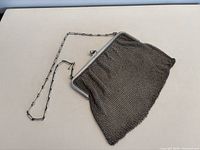 Full view of sterling chainmail purse with chain