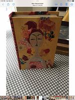 Closed book-style jewelry box showing full front cover design