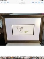 Full view of framed print showing brown frame, mats, and artwork