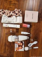 Full lot layout on wood surface showing all items